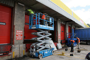 Repairs to lorry loading bay canopy cladding and soffit sheeting